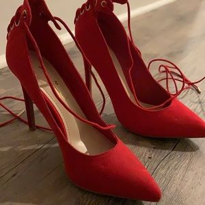 Red strap up heels